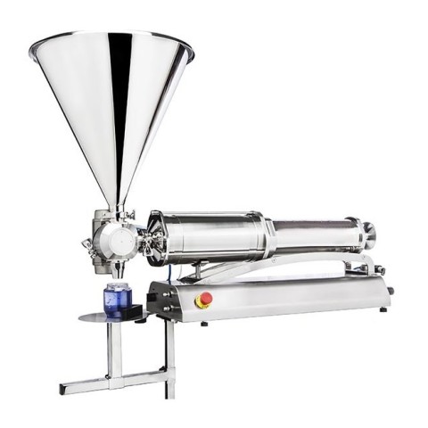 Volumetric filling machine for jars and bottles