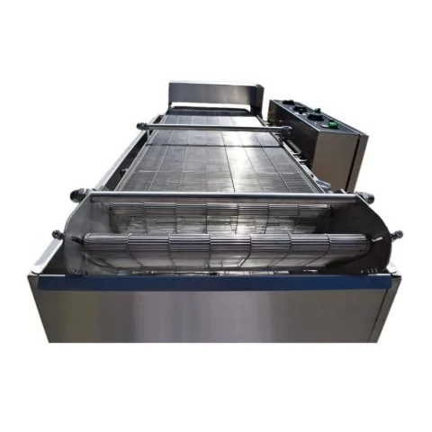 Industrial continuous fryer with two conveyors