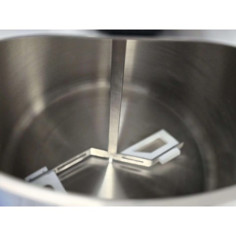 Stirrer for a cheese cooking kettle