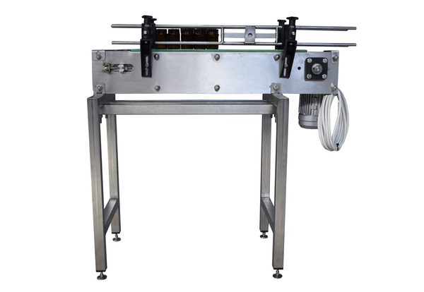 Continuous fryer with product discharge conveyor