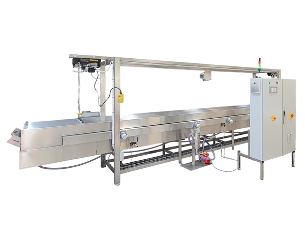Continuous fryer for industrial food processing