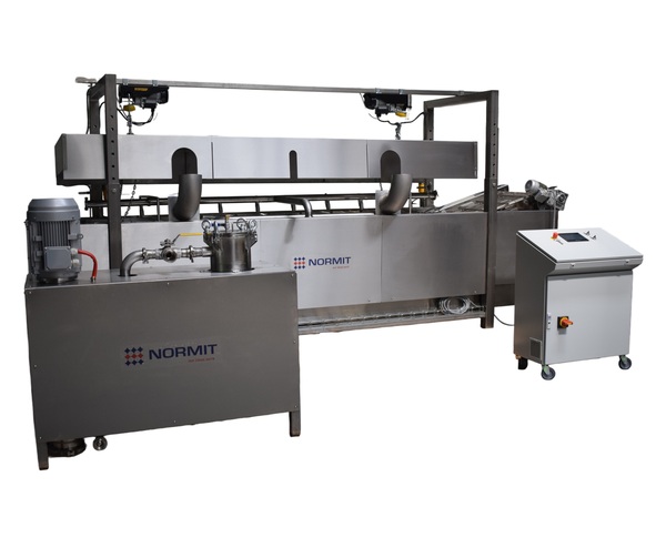 Continuous fryer for commercial food production