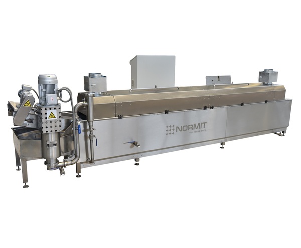 Continuous oil frying system with conveyor