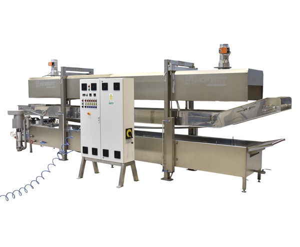 Continuous fryer for snack production
